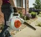 Gray and orange and black STIHL Hand-held Blower, Gas Powered